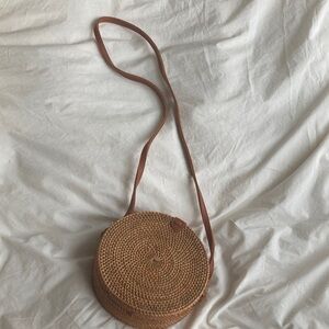 Round Woven Tan Crossbody Bag strap 47 inches and inches wide